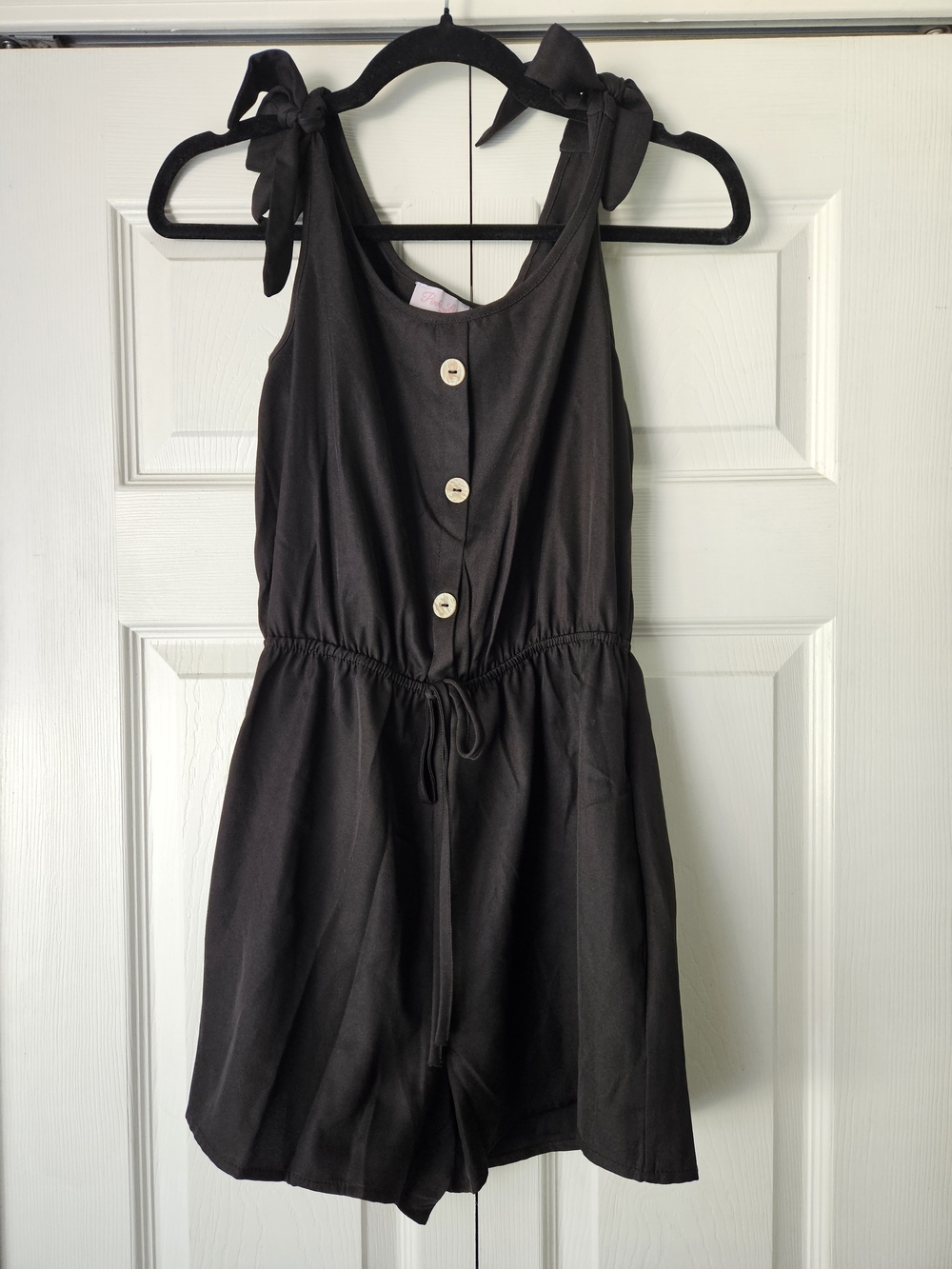 Pink Lily Black Tie-Shoulder Romper with Button Front